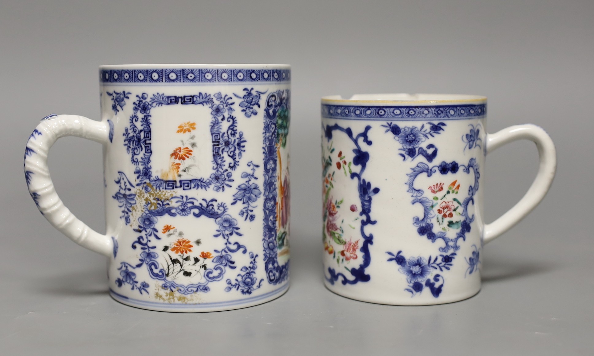 Two late 18th century Chinese exports famille rose mugs, tallest 12cm (2)